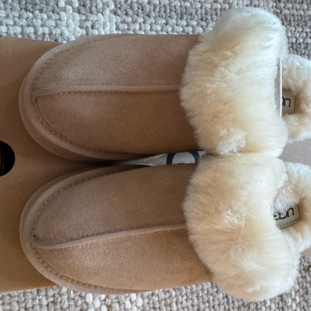 Brand New still in box UGG Tan Slippers with Plush Fur Lining and Slip-On Style